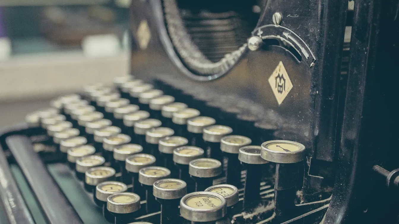 a close up of an old typewriter